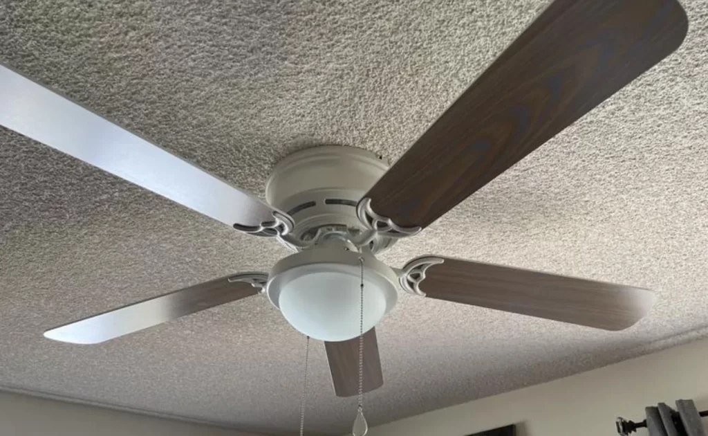 Harbor-Breeze Armitage Ceiling Fan Installed in Bedroom, White Pearl Color